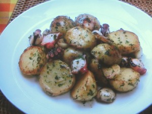 新じゃがとたこの炒め物